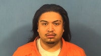 Gang member fired shots at vehicle in Chicago suburb, prosecutors say