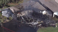 Firefighters rescue 2 from balcony during McHenry condo fire