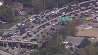 Kennedy Expressway crash: Forklift falls from tow truck, closes lanes