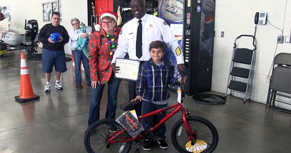 Firefighters reward boy with bike for saving mom's life | FOX 35 Orlando