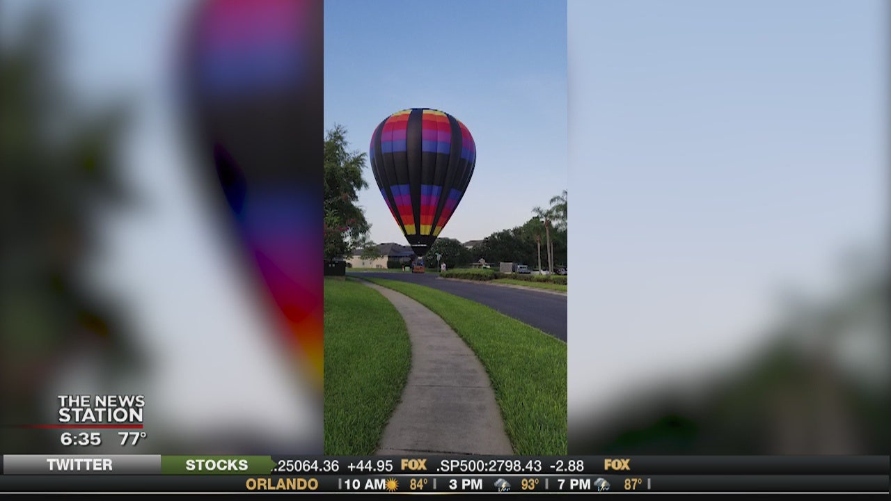 Hot air balloons lands in Kissimmee neighborhood