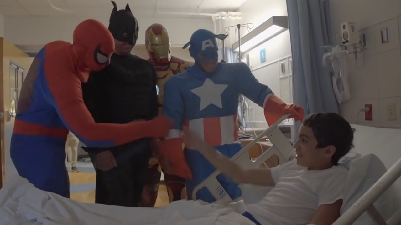 visit children's hospital superhero