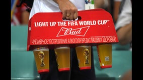 Angry World Cup fan throws beer in reporter's face during live broadcast