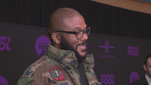 Tyler Perry trades 'Madea' suit for Santa suit