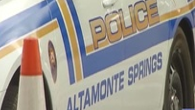 Stolen vehicle suspect goes missing after running into retention pond while fleeing officers, police say