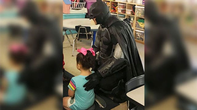 'Amazing': Batman walks bullied 3-year-old to preschool in Florida