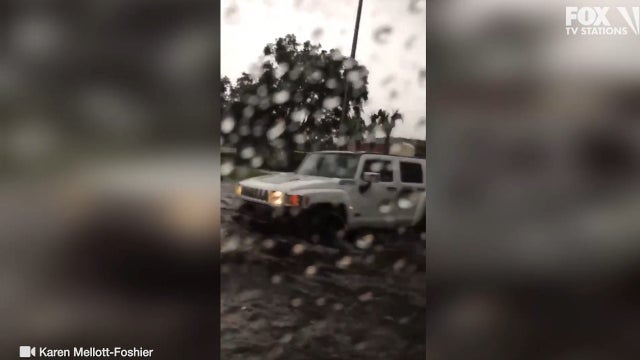 Heavy rain causes flooding in Orlando's tourist district