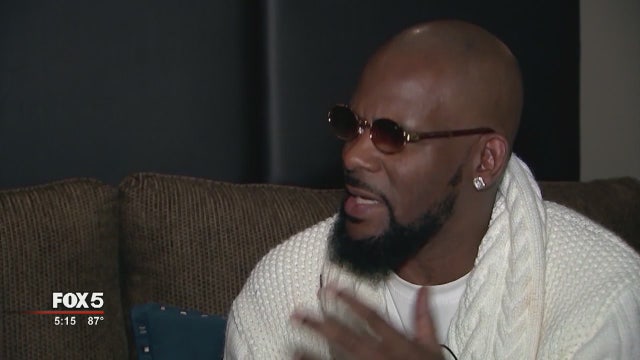 Protesters demonstrate outside R. Kelly concert