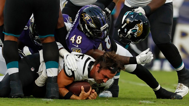 Jackson, Ravens' defense combine for 29-0 win over Jaguars