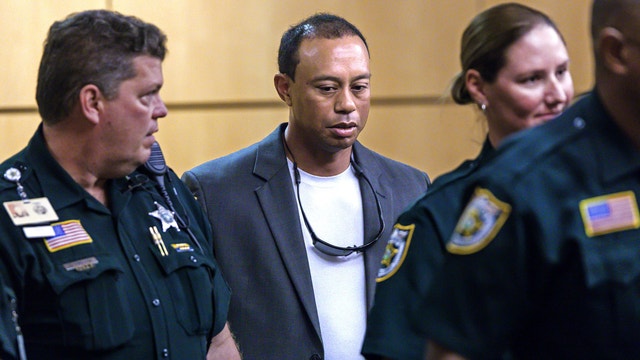 Woods says he's on the 'other side' of pain killers and is loving life