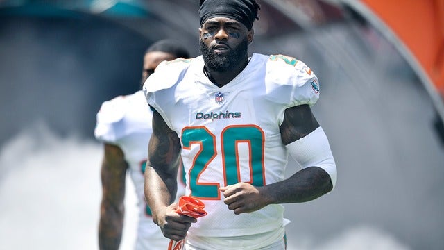 Safety Jones misses Dolphins' 1st practice under new coach