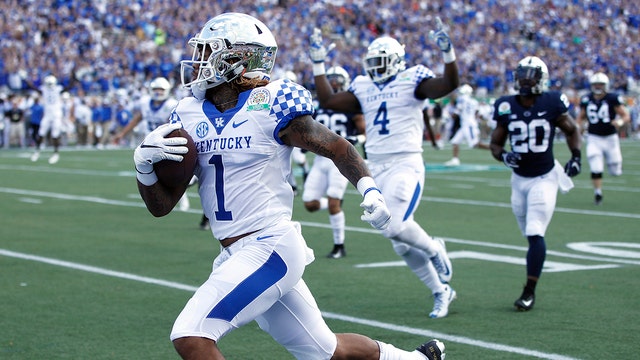 Snell runs wild, No. 16 Kentucky holds off No. 13 Penn State