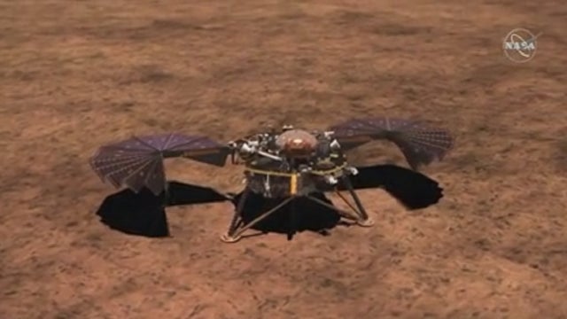 Mars lander's digger is burrowing again after snag