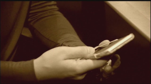 Bill filed in Florida would ban holding phones while driving