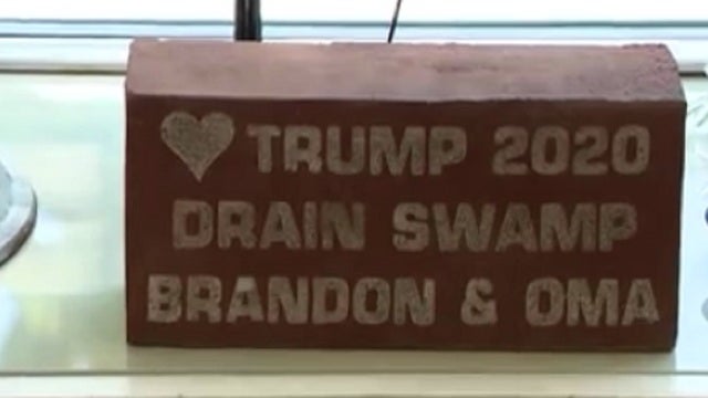 Woman's brick supporting President Trump back in the ground