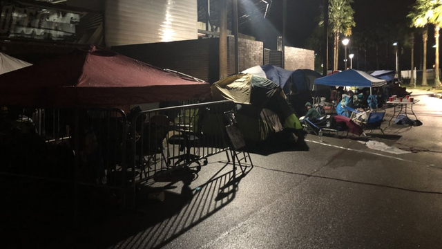 UCF fans camp out in the rain for tickets to the Fiesta Bowl