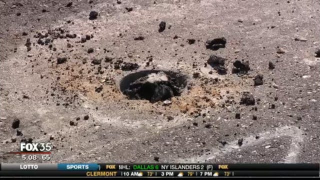 Crews work to fill holes on 17-92 in Sanford
