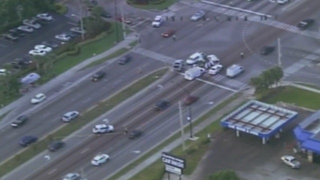 Person in motorized electric wheelchair fatally struck by vehicle