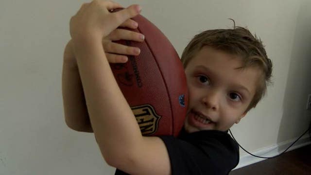 6-Year Old Autistic Boy Got Football from Cam Newton