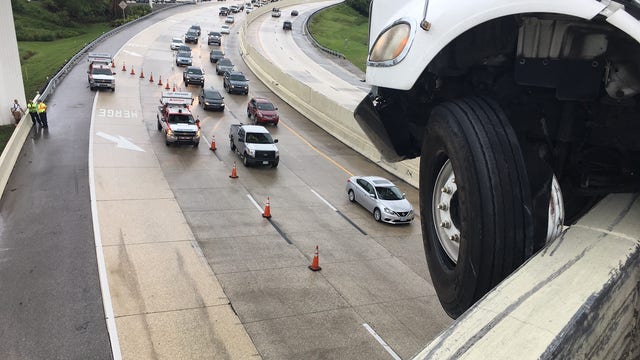 Tractor trailer crashed along I-4 WB due to slick roadway