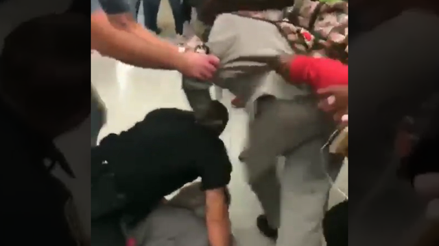 WATCH: Florida cop making arrest is kneed, kicked in face by student