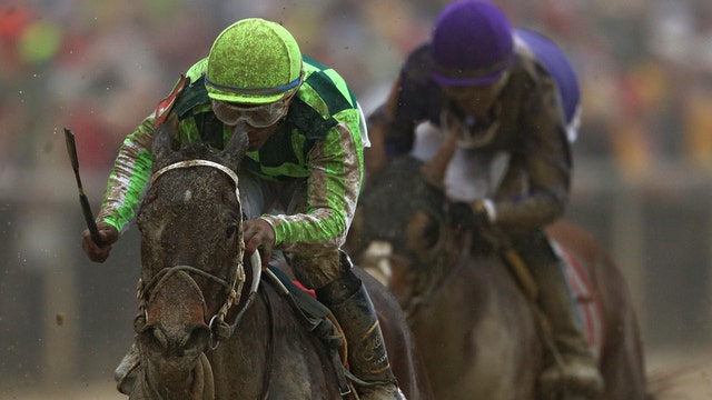 War of Will wins Preakness, holds off riderless horse