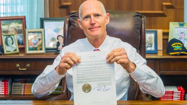 Florida governor: 'The UCF Knights are clearly champions'