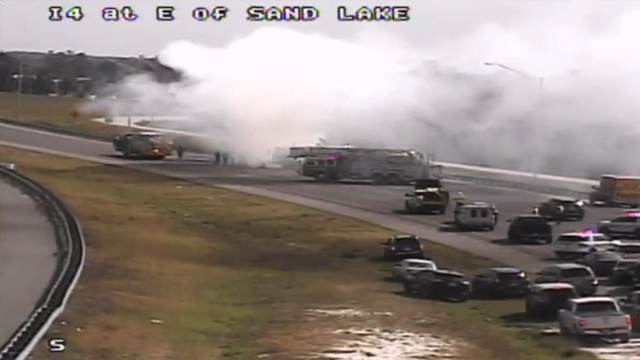 Shuttle bus fire on Interstate 4 near Sand Lake Road