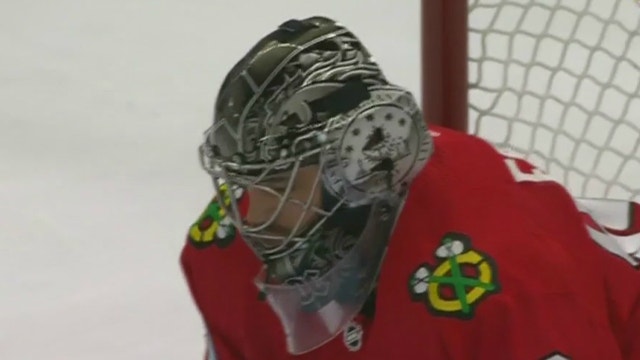 Accountant-turned-goalie helps Blackhawks beat Jets