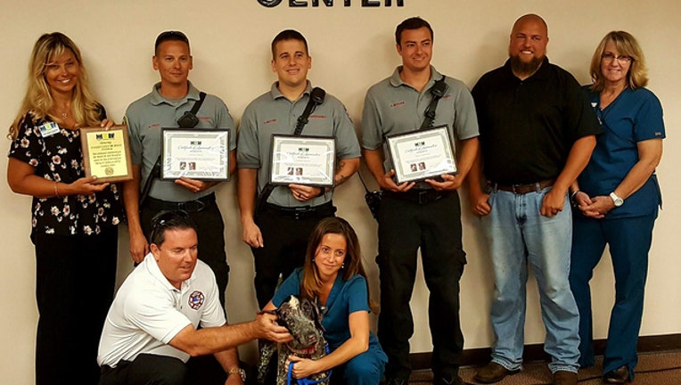 4db29e03-Flagler Humane Society honors-firefighters_1491957487182.jpg