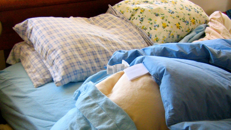 30606b9e-Stock image of bed by Liz West via Flickr-404023