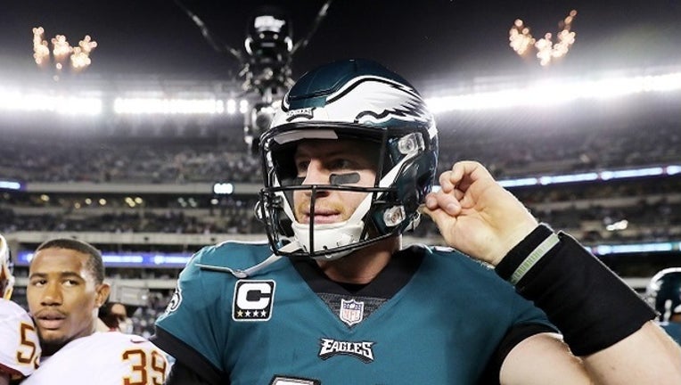 755880ee-GETTY_carson_wentz_fireworks-401096