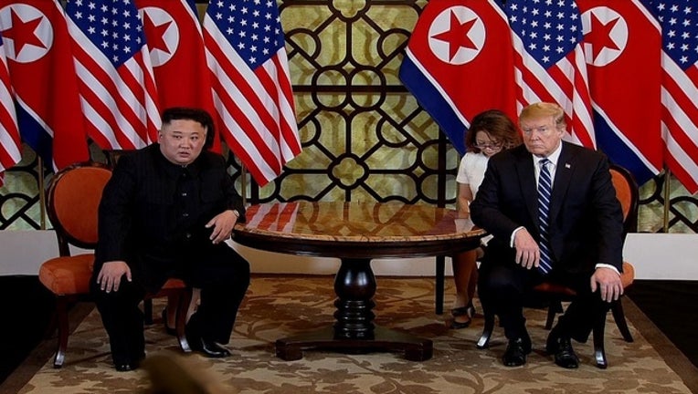 15bd2e93-GETTY IMAGE_TRUMP AND KIM JUNG UN_32219