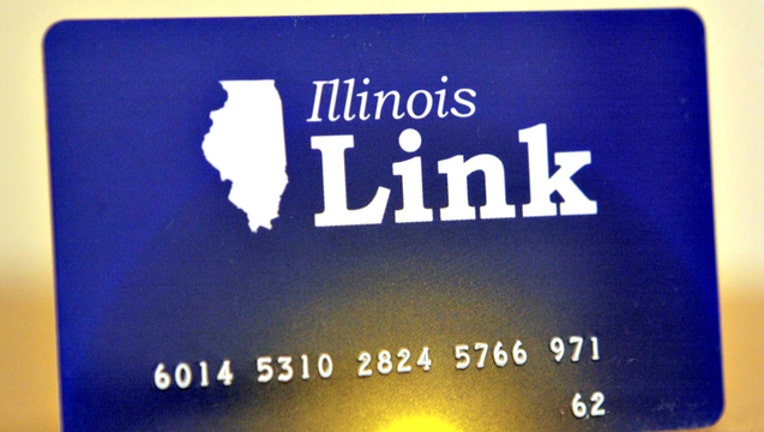 6bb2f9f7-GETTY food stamps illinois link card_1557955626320.jpg-404023.jpg