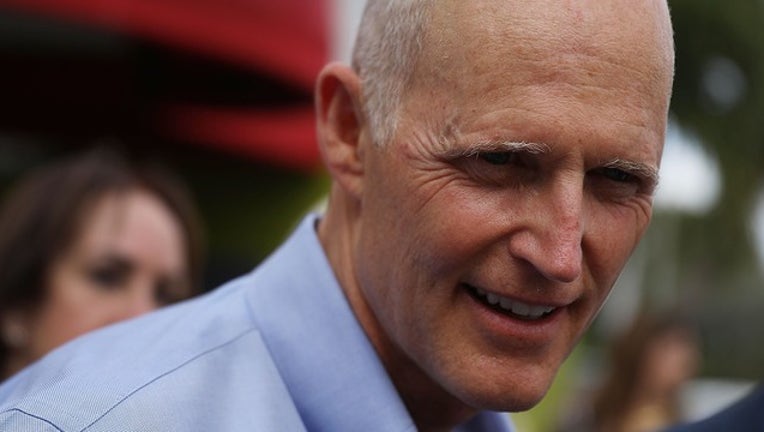 24950073-GETTY rick scott_1523272794067.png.jpg