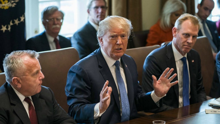 2ed28794-GETTY trump syria_1523304228726.jpg-404023.jpg