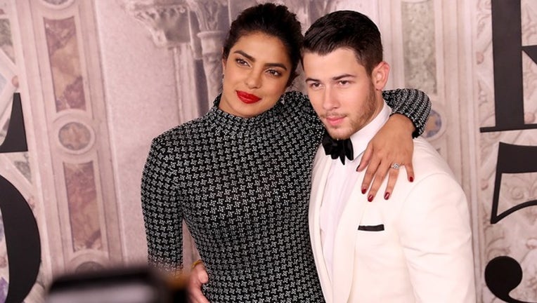 d21ebc24-GETTY_nick jonas and priyanka chopra_120218_1543765148689.png.jpg