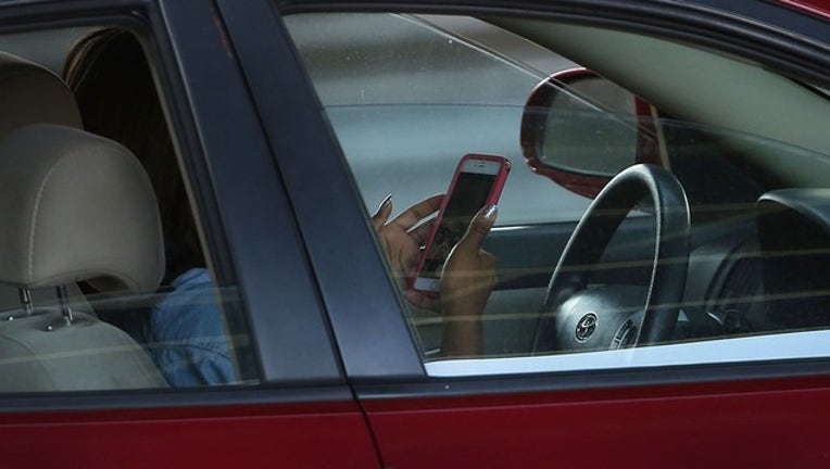 3637b174-GETTY_texting while driving_031819_1552903014405.png.jpg