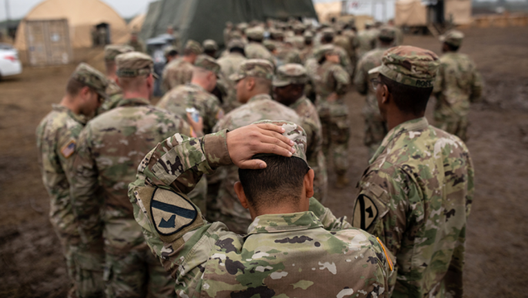 8be03cdd-GETTY_troops_120218_1543768184191.png