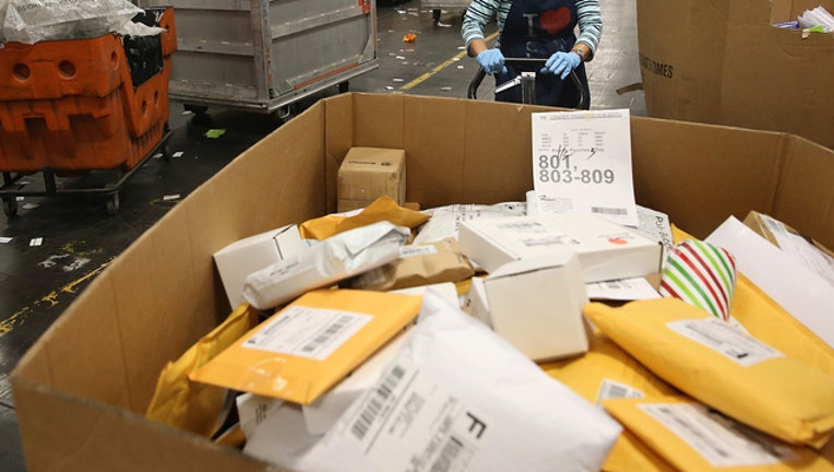 4262413e-GETTY US Post Office Packages 101918-408200