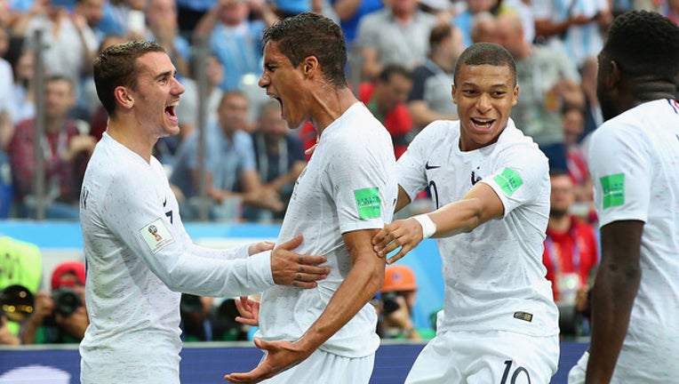 6094c085-GETTY-France-beats-Uruguay_v__1530917194165