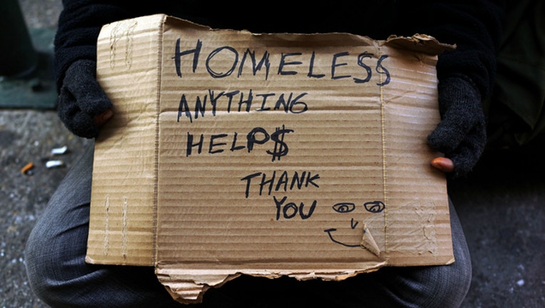 56a2f306-HOMELESS SIGN GENERIC GETTY_1543716994365.jpg-401720.jpg