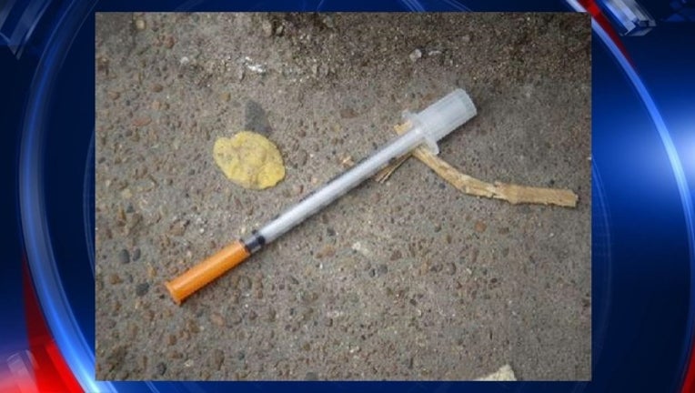 Heroin_needle_in_the_gutter_1487688800398.jpg