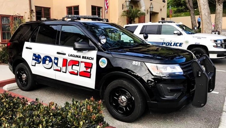 3f81a669-LAGUNA BEACH PD_police car american flag_041419_1555257576252.png.jpg