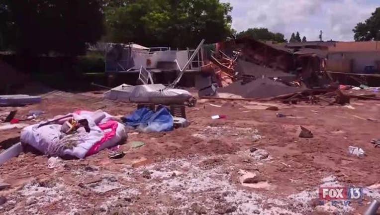 56690a51-SkyFOX_Drone_video__Pasco_sinkhole_0_20170714192040-401385