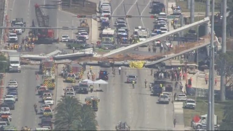 f810740a-SkyFOX_view__FIU_pedestrian_bridge_colla_0_20180315191503-401385