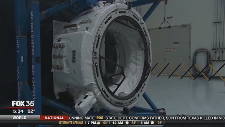 1b7d274e-SpaceX_carrying_docking_adapter_to_ISS_0_20160715222342