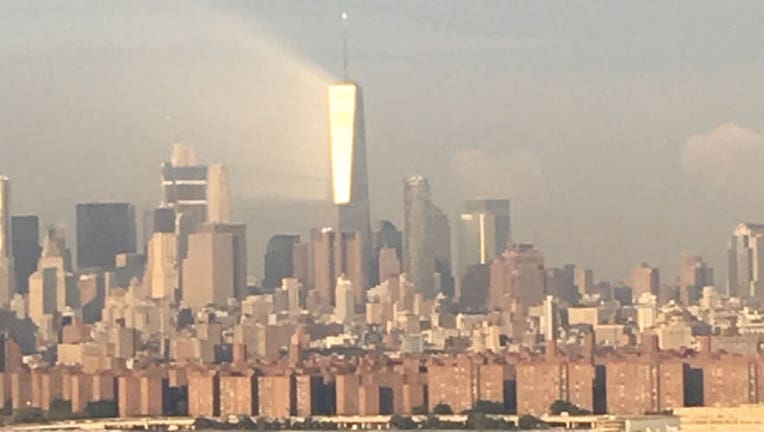 f897c993-Ray of Light Beams Off 1 WTC-402970