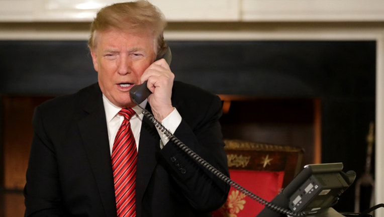 bad78358-TRUMP CHRISTMAS CALL GETTY_1545826341638.jpg-401720.jpg