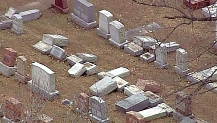 de605fc1-Tombstones damaged_1488155553173.jpg